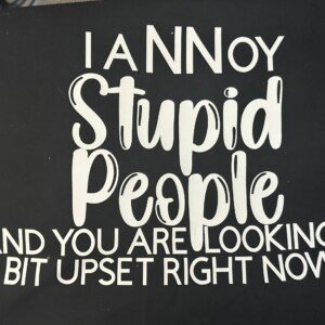 Unisex T-Shirt that has I Annoy Stupid People And You Are Looking A Bit Upset on the front